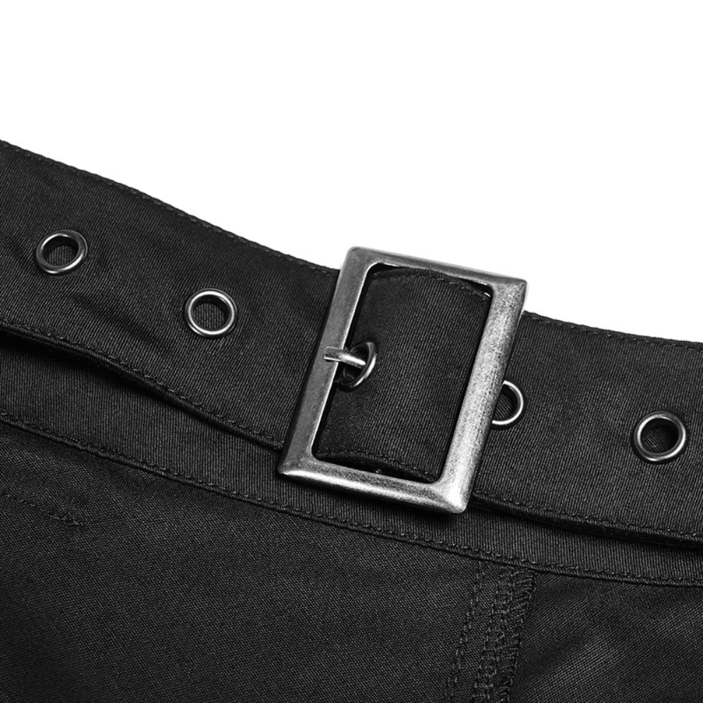 Close-up of the adjustable belt on a stylish black asymmetrical cargo mini skirt, showcasing its edgy design.