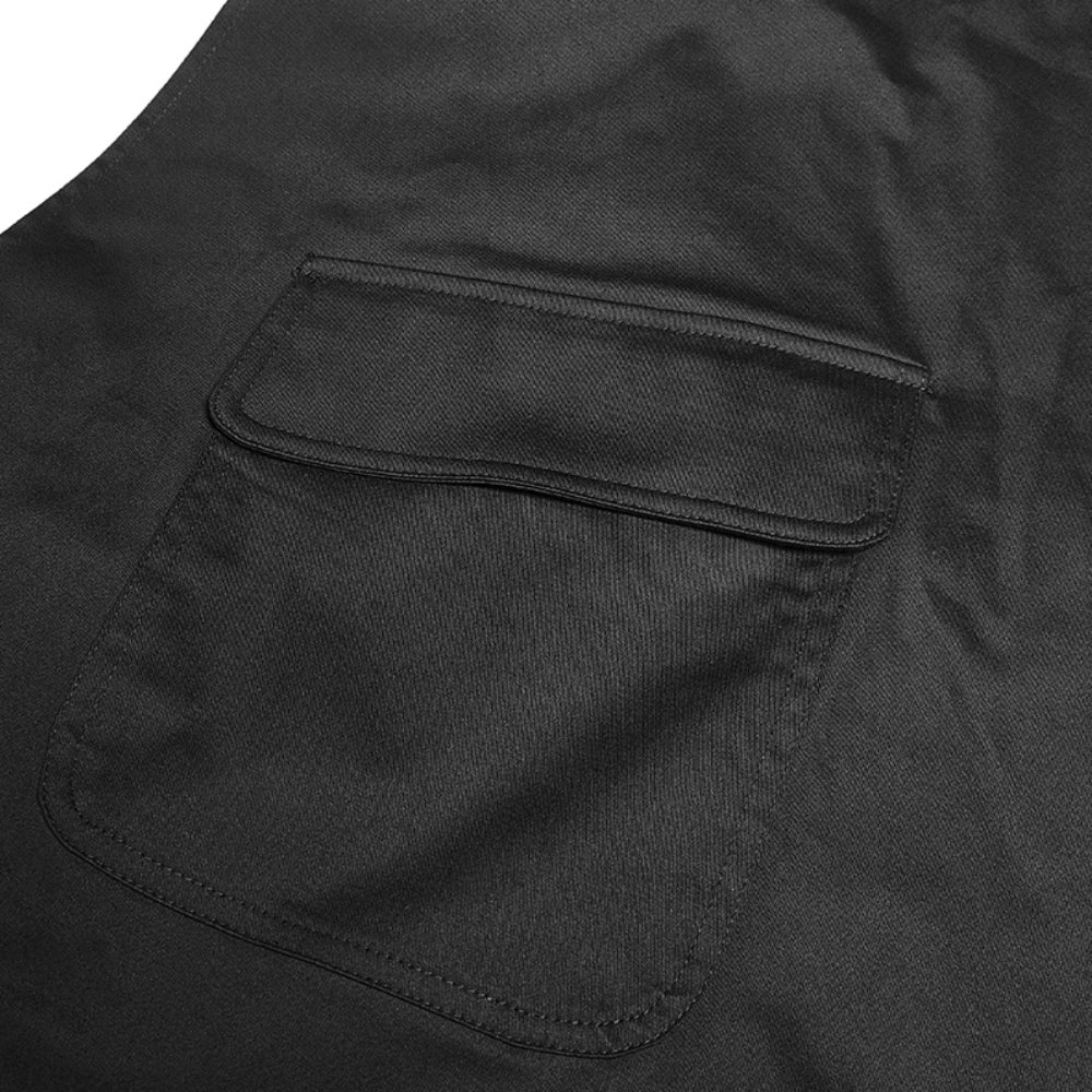 Detail of a black cargo pocket on a stylish punk asymmetrical mini skirt.