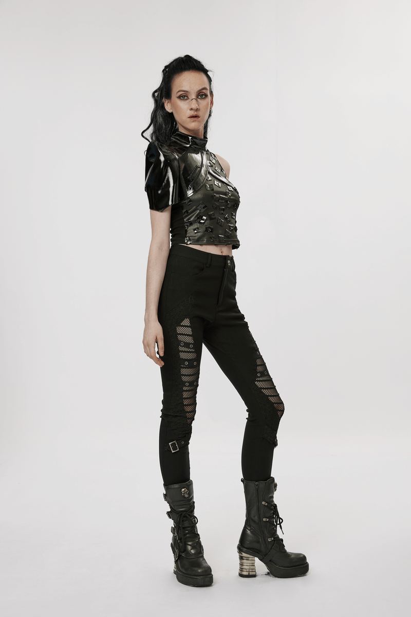 Model showcasing stylish punk black mesh insert buckle skinny pants with edgy cropped top and combat boots.
