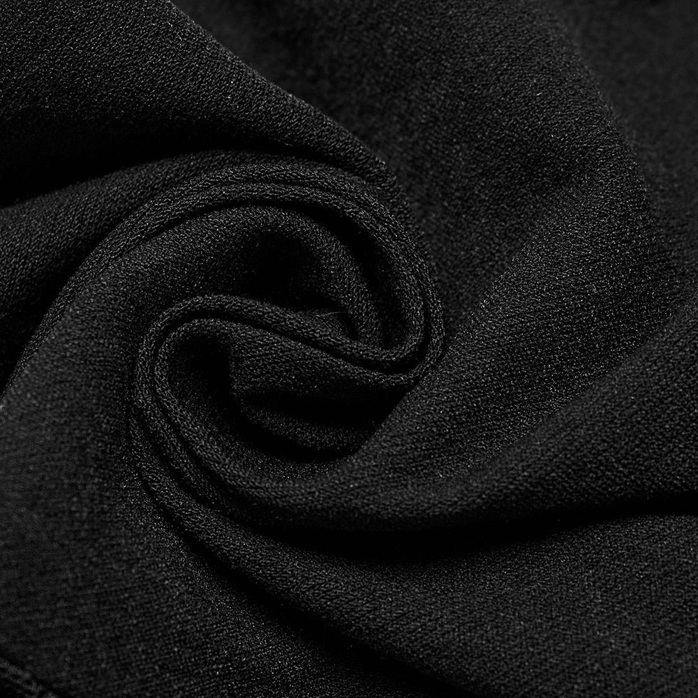 Close-up of soft, black fabric showcasing stretchy twill material for stylish leggings.
