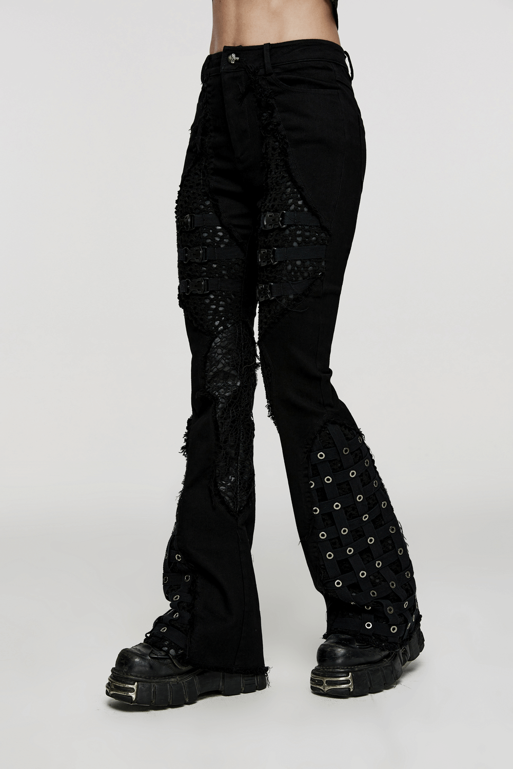 Edgy gothic style flared pants with mesh inserts and eyelets, perfect for a punk-inspired wardrobe.