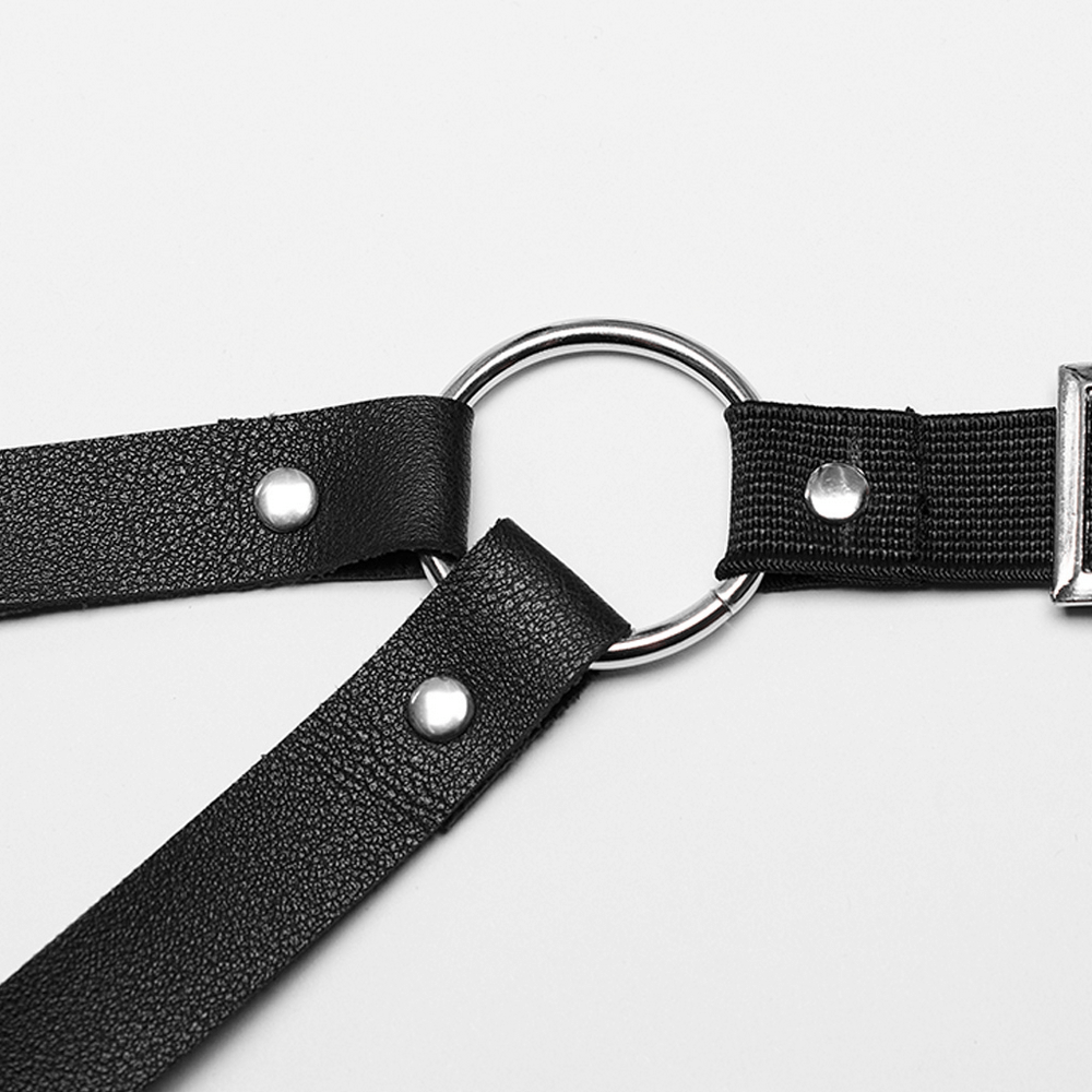 punk harness detail with metal ring and adjustable strap