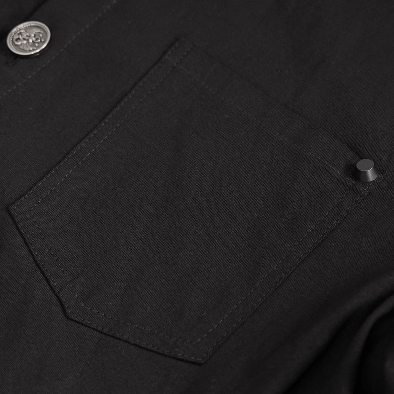 Close-up of a stylish black shirt pocket with button detail, showcasing punk fashion details.