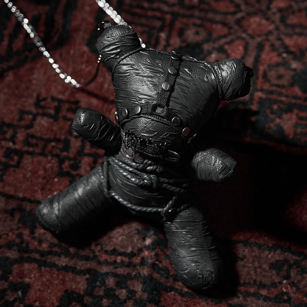 Gothic Taboo Bear plush in black leather-like texture, showcasing edgy style with detachable chain for fashion or decor.