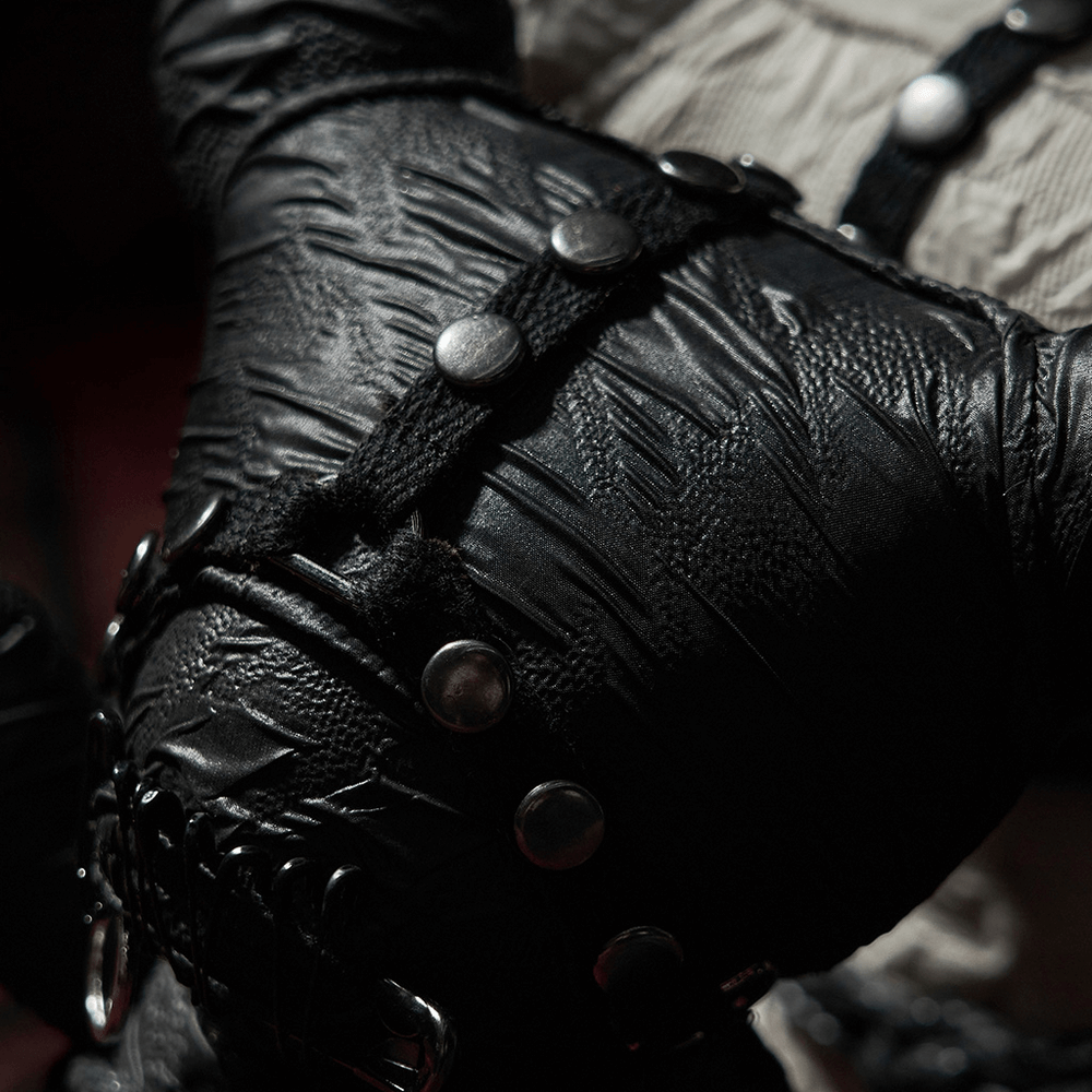 Close-up of the textured black fabric on the Gothic Taboo Bear plush with decorative button details, showcasing edgy style.