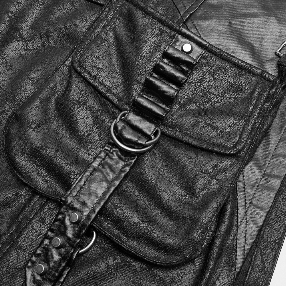 Close-up of black cracked fabric with adjustable buckle and removable pocket on men's punk kilt skirt.