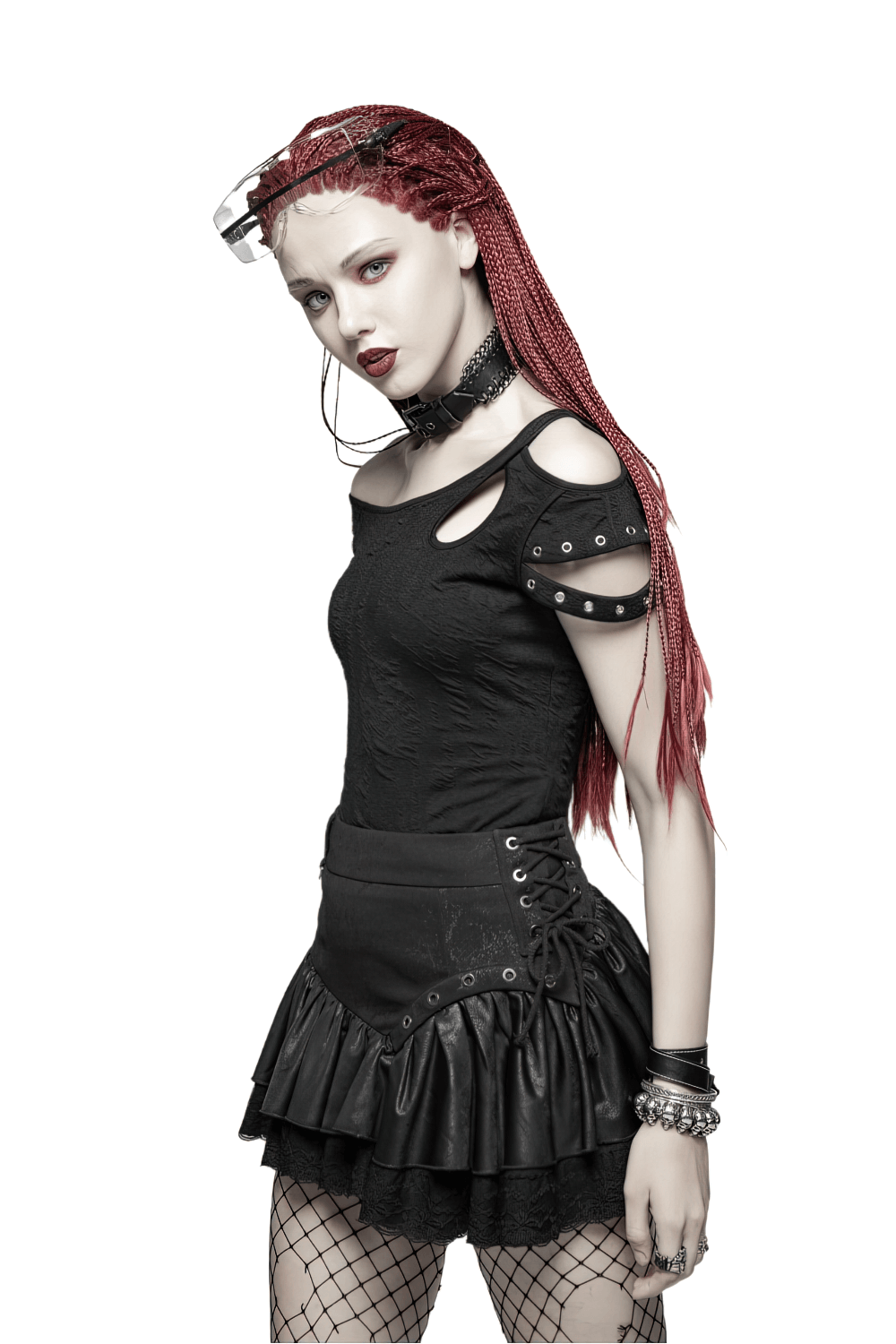 Edgy punk rock model wearing a stylish black mini skirt with ruffles and lace, showcasing fierce attitude and trendy accessories.
