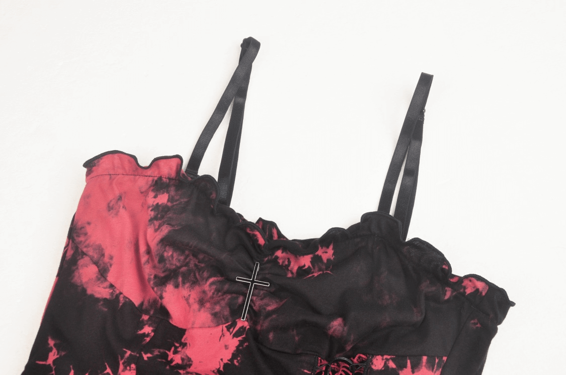 Stylish punk rock dress in fiery red and black with edgy straps and cross detail, perfect for rebellious fashion lovers.