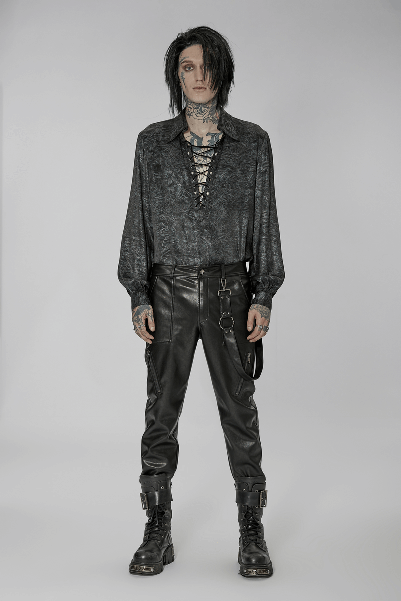 Stylish punk rock look featuring faux leather lace-up pants and a dark, edgy shirt for streetwear fashion.