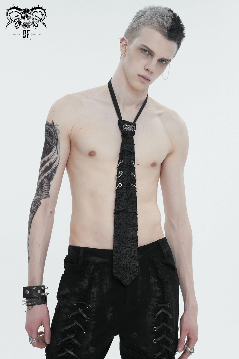 Stylish punk skull necktie with rings on model, showcasing gothic fashion for a bold statement look.