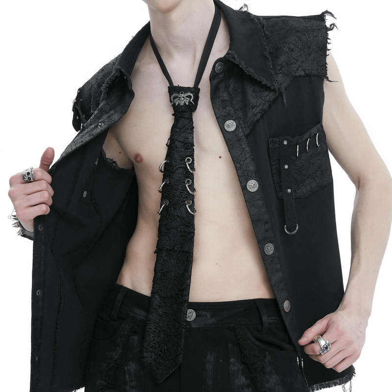 Stylish punk skull necktie with rings worn by model in a gothic outfit, showcasing bold fashion statement.