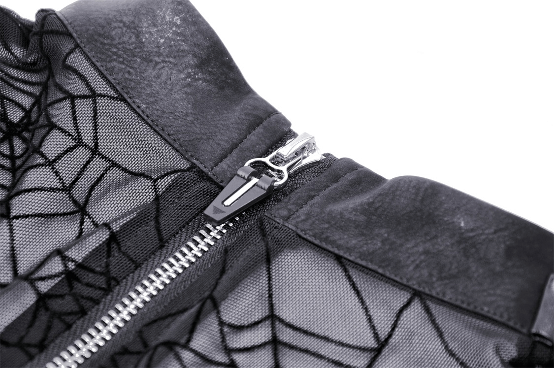 Close-up of stylish black mesh with spiderweb design and zipper, perfect for a goth-inspired look.