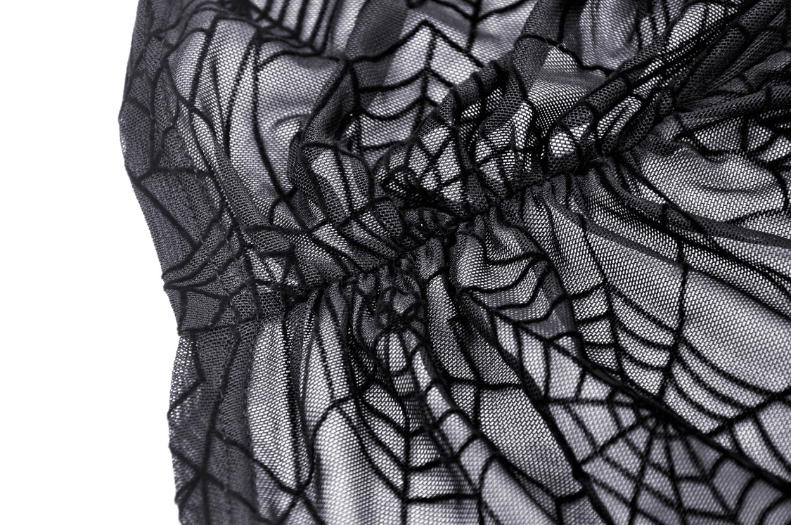 Close-up of black mesh fabric featuring an intricate spiderweb design, perfect for a stylish punk aesthetic.