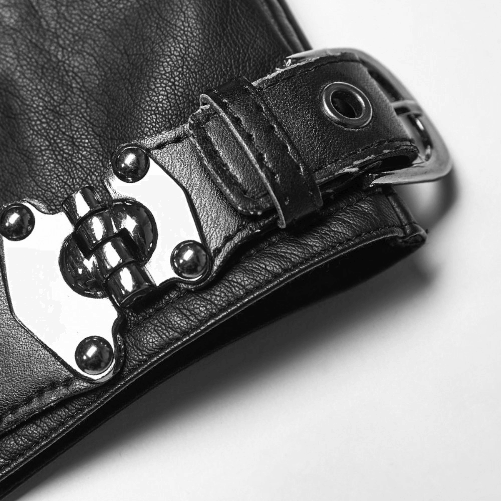 Close-up of black leather with metal buckle detail, highlighting punk style elegance and edgy design.