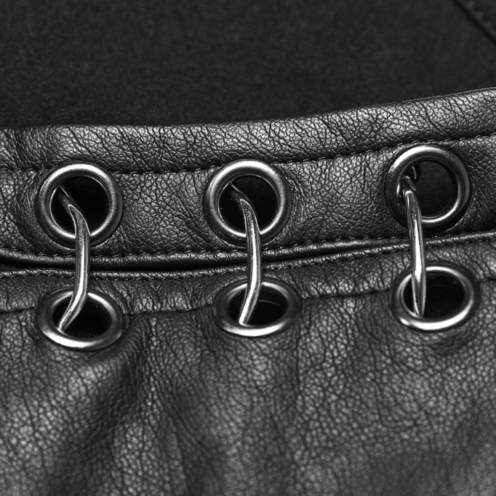 Close-up of black lace-up details on stylish punk vest, showcasing metal grommets and leather texture.