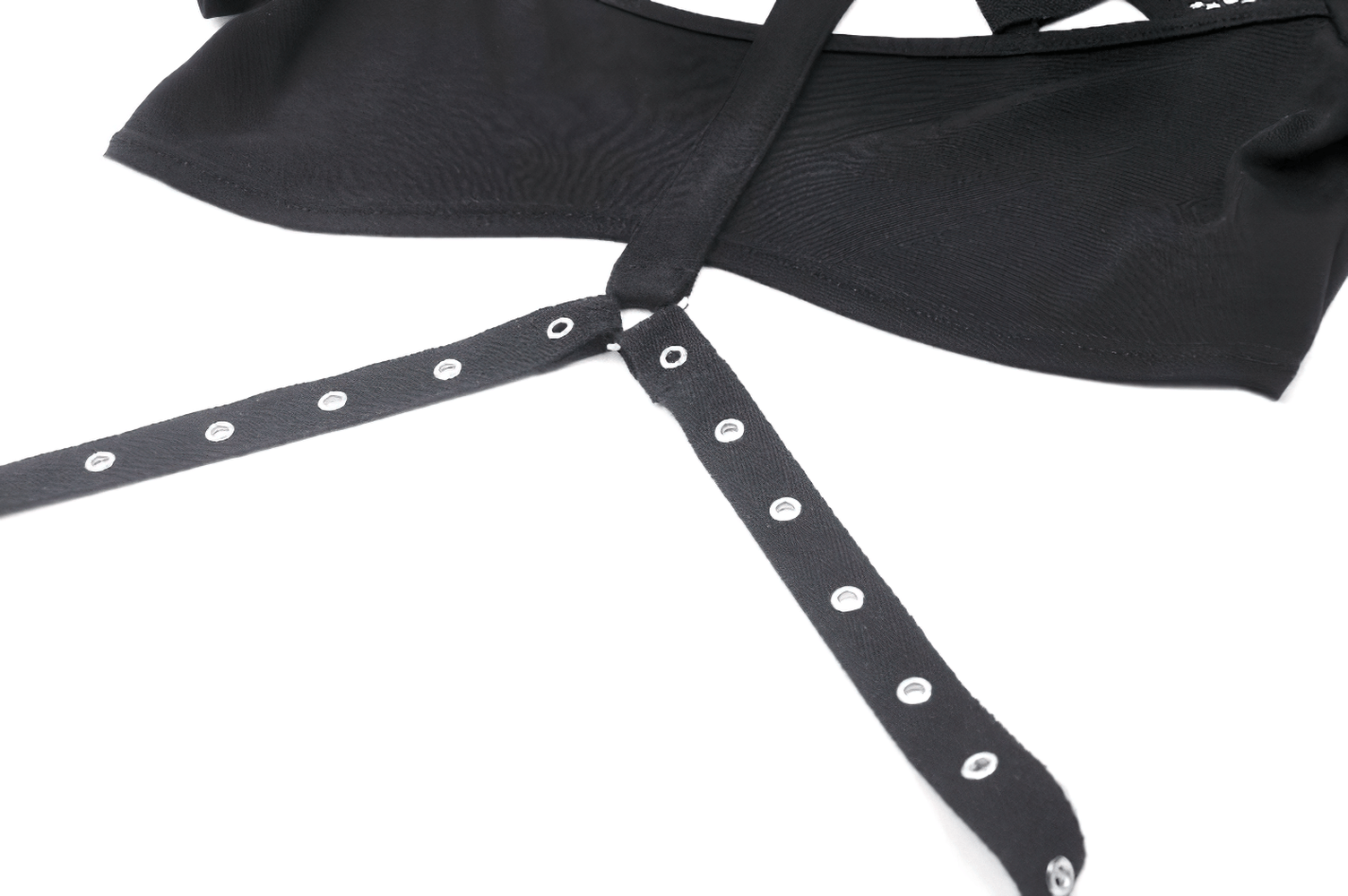 Stylish black women's crop top with metal accents and rivet details, perfect for punk fashion lovers.