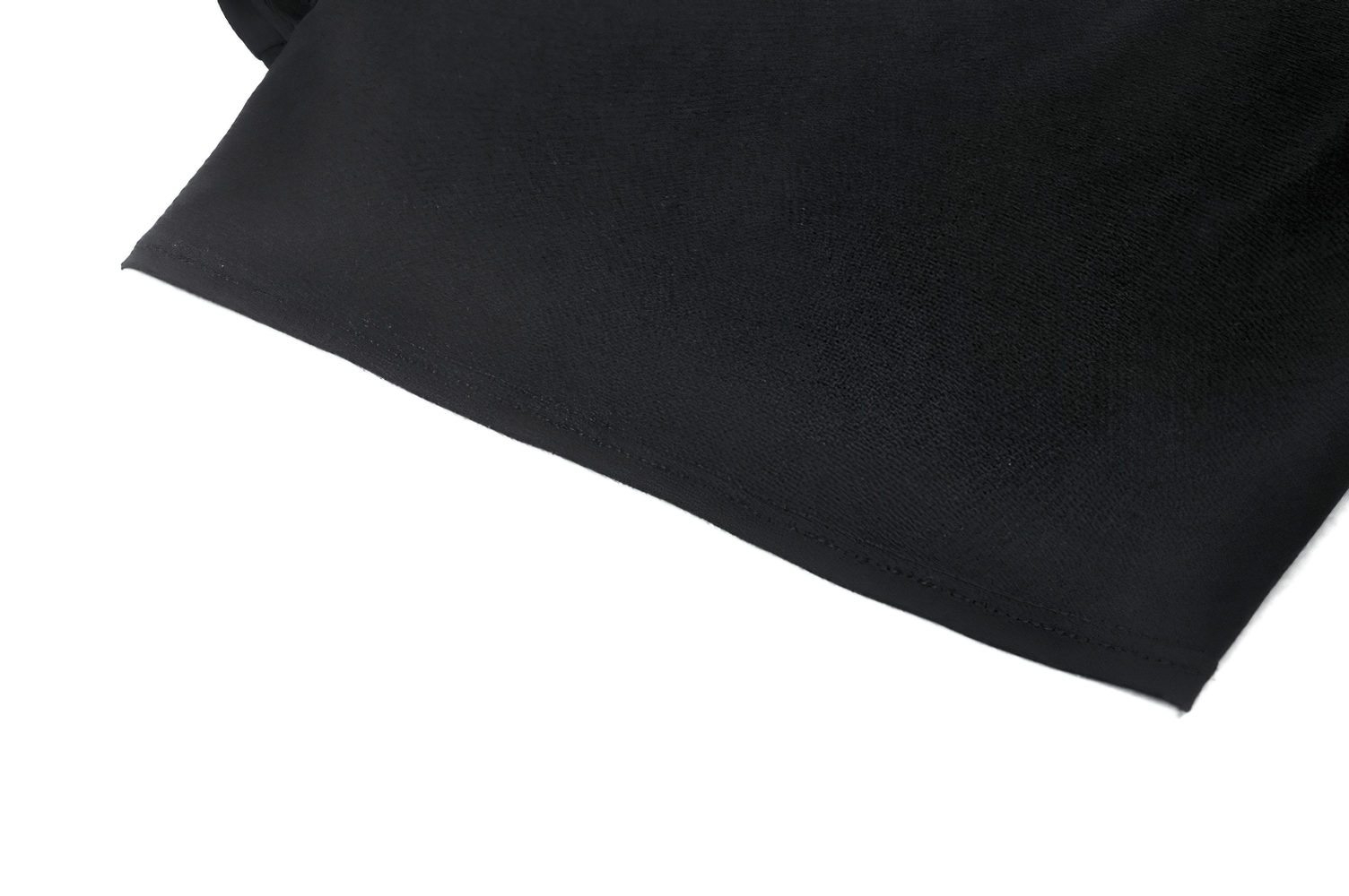 Close-up of a stylish black women's crop top with metal accents and rivet details, perfect for punk fashion.