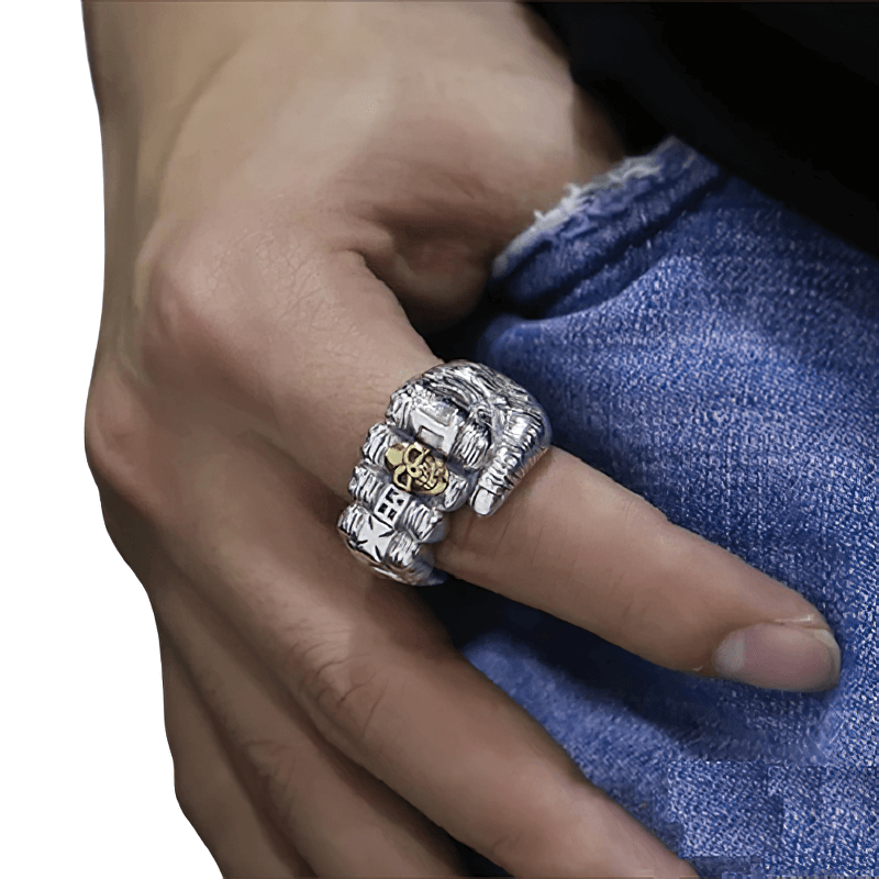 Stylish unisex fist-shaped ring in sterling silver, perfect casual accessory for men and women.