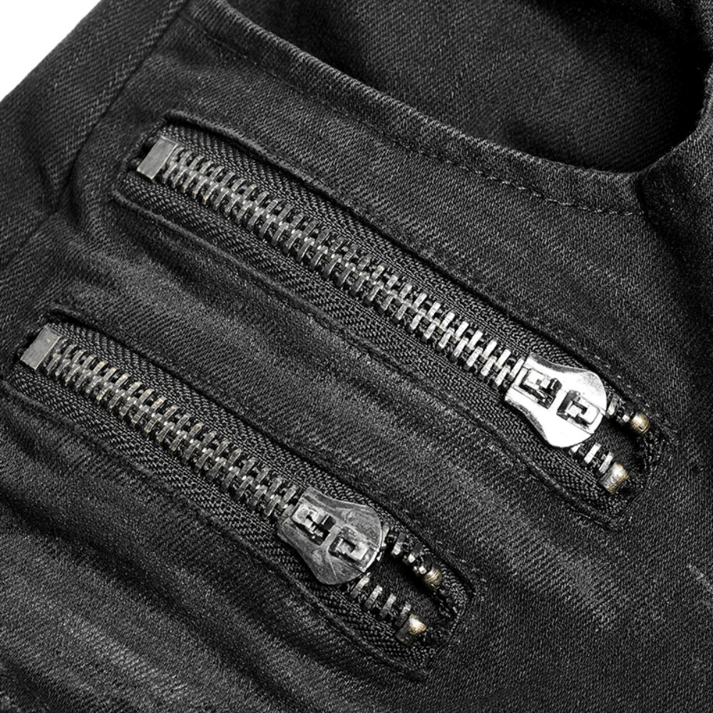 Close-up of stylish black cargo pants featuring edgy zip details and a distressed fabric finish.