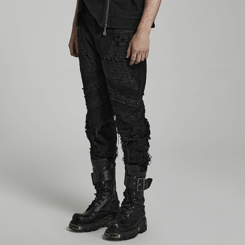 Stylish ripped black gothic trousers for men, featuring edgy distressed design and textured details.