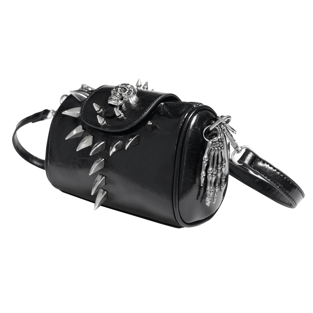 Edgy black leather handbag with spikes and silver skeleton charm, perfect for bold fashion statements.