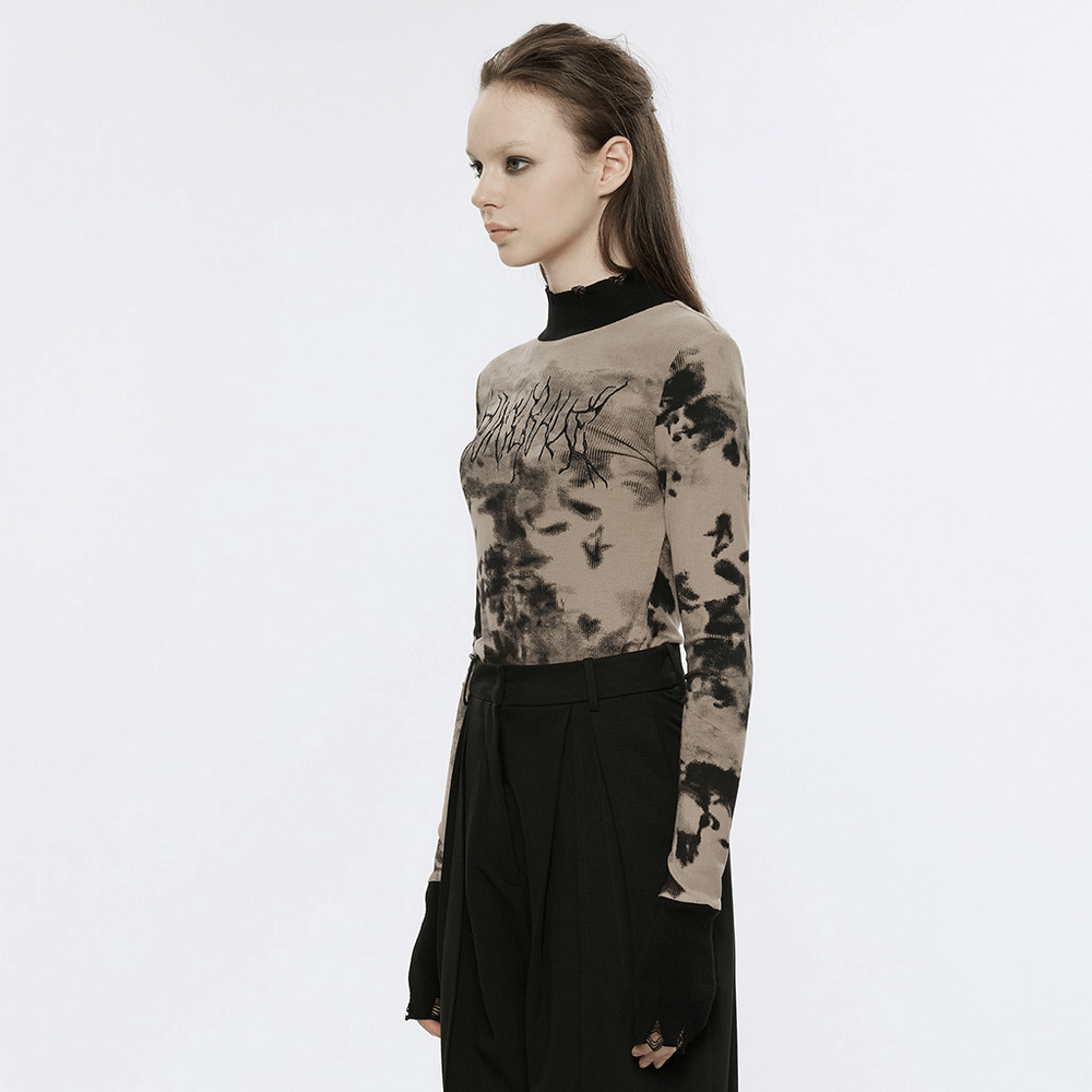 Stylish tie dye turtleneck top featuring Punk Rave embroidery and ripped cuffs for an edgy streetwear look.