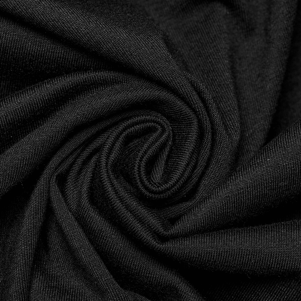 Close-up of soft black fabric showcasing its luxurious texture and drape, perfect for stylish garments.