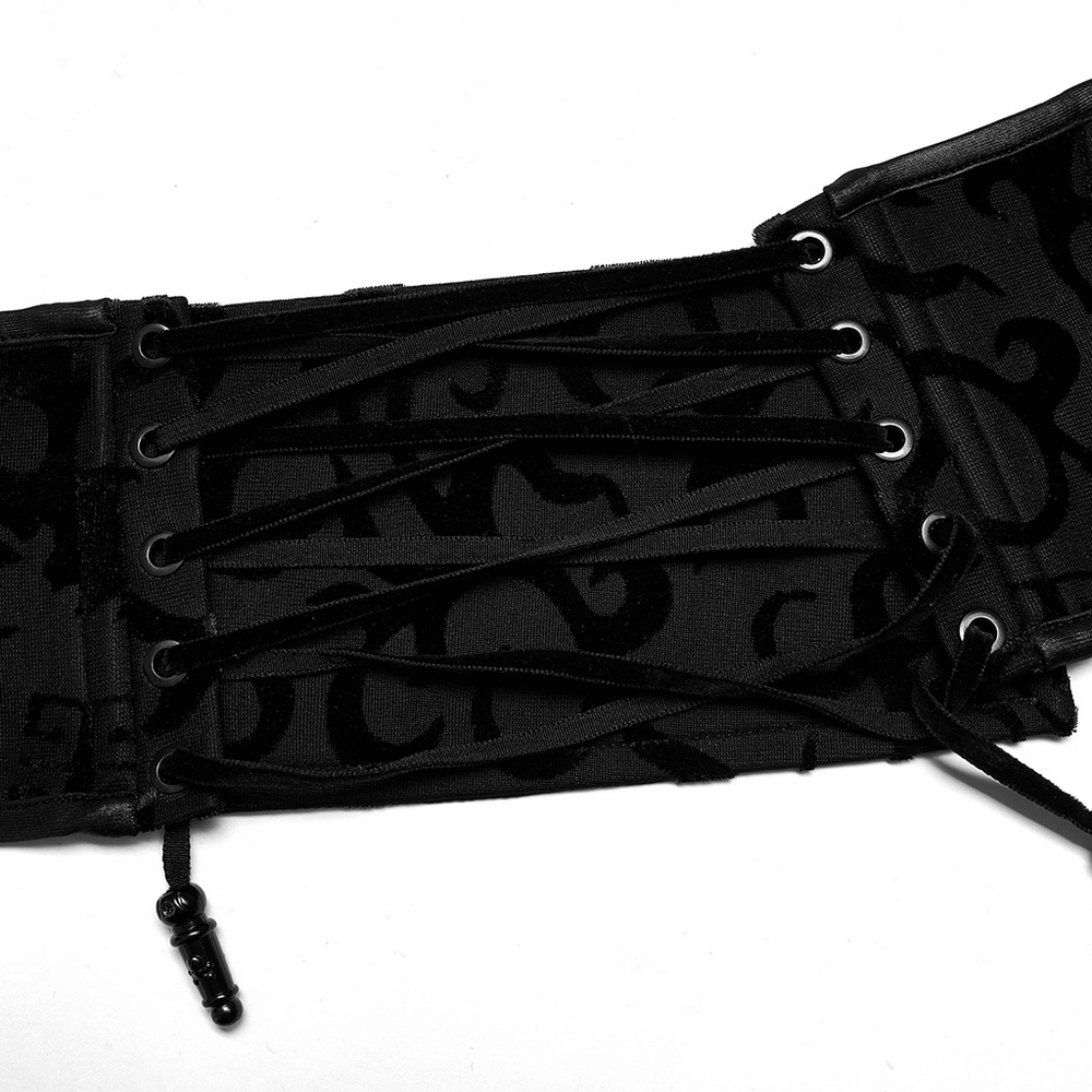 Black lace-up corset belt with intricate dragon print, perfect for a gothic-inspired style.