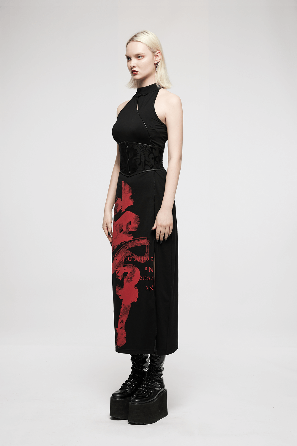 Stylish model showcasing a black dragon print corset belt with lace-up design, featuring a sleek gothic-inspired outfit.