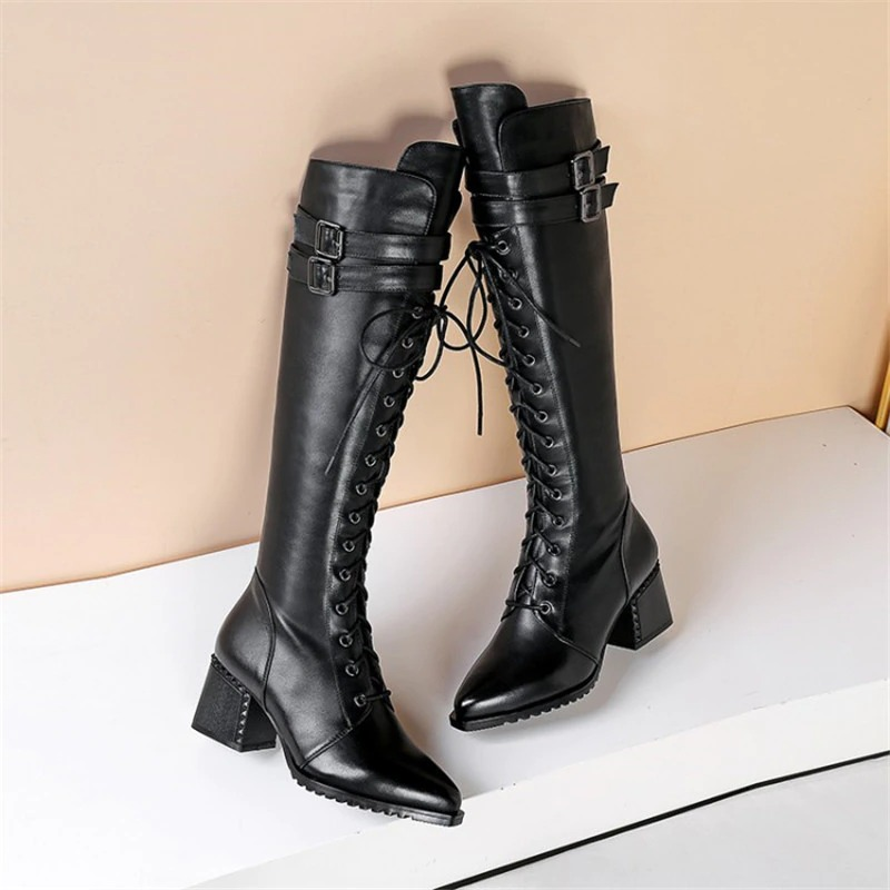 Stylish black leather women's boots with square heel and lace-up design, perfect for goth and rock fashion.