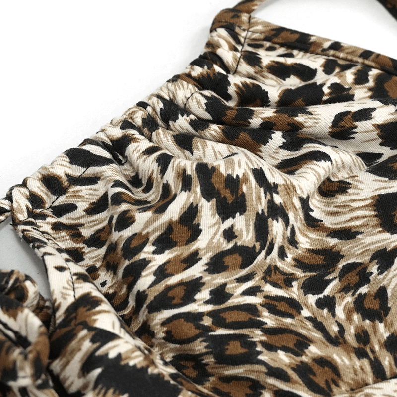 Close-up of stylish women's leopard print swimsuit fabric, showcasing modern design and vibrant colors.