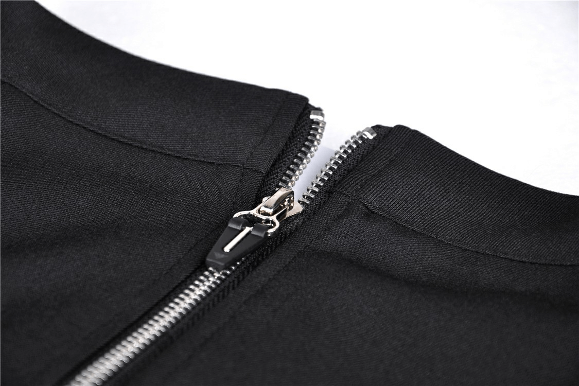 Close-up of zipper detail on a stylish black garment, showcasing the sleek metal design and flawless stitching.