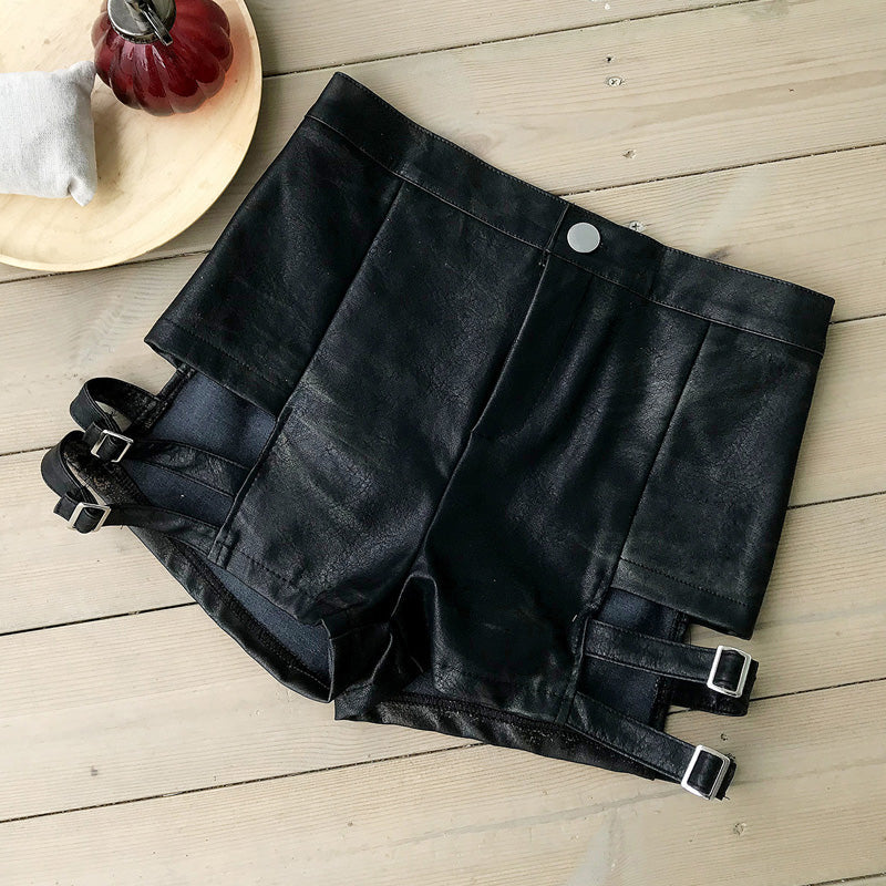 High waist black imitation leather shorts with adjustable straps for a gothic summer fashion look.