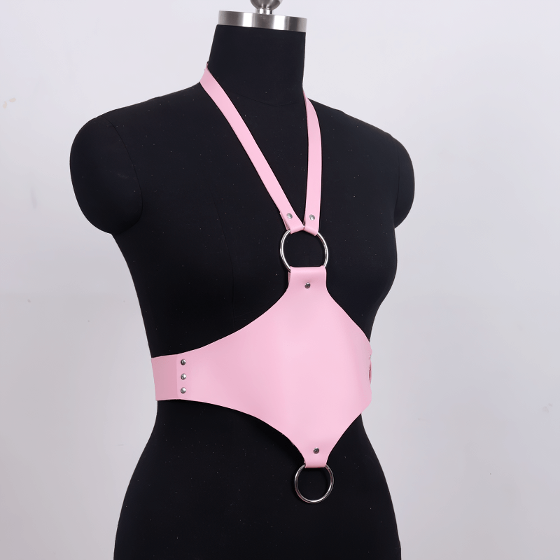 Pink faux leather body harness with adjustable straps and metal rings for a stylish gothic look.