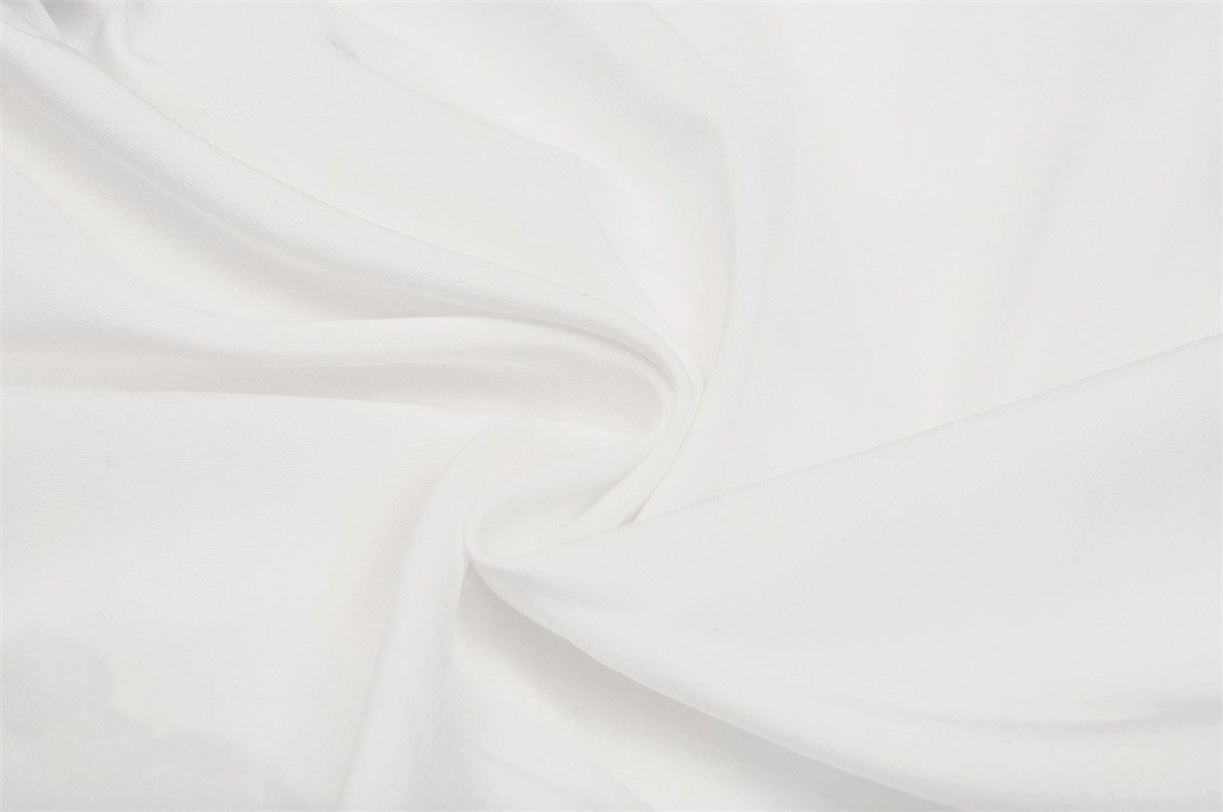 Soft white fabric with a smooth texture, perfect for crafting a Sweet Lolita mini skirt.
