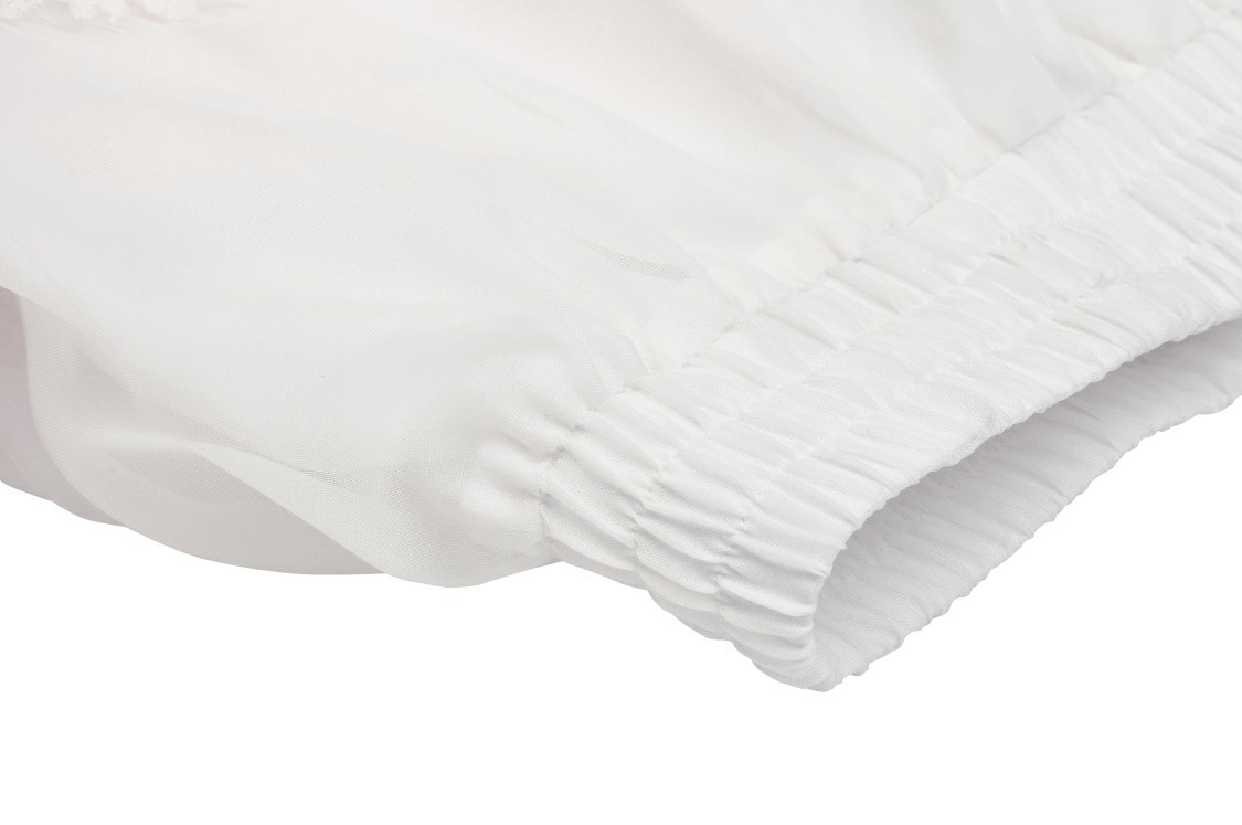 Close-up of the waistband of a Sweet Lolita white pleated mini skirt, showcasing its stylish elastic detail.