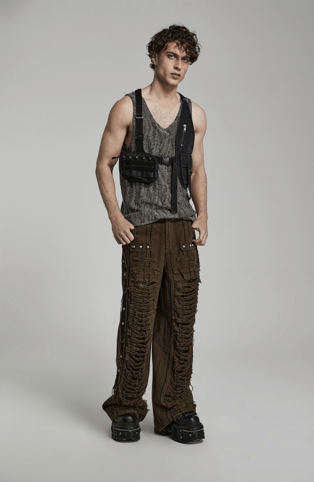 Model showcasing Tactical Punk Detachable Bag with Belt, featuring an edgy outfit and avant-garde design.