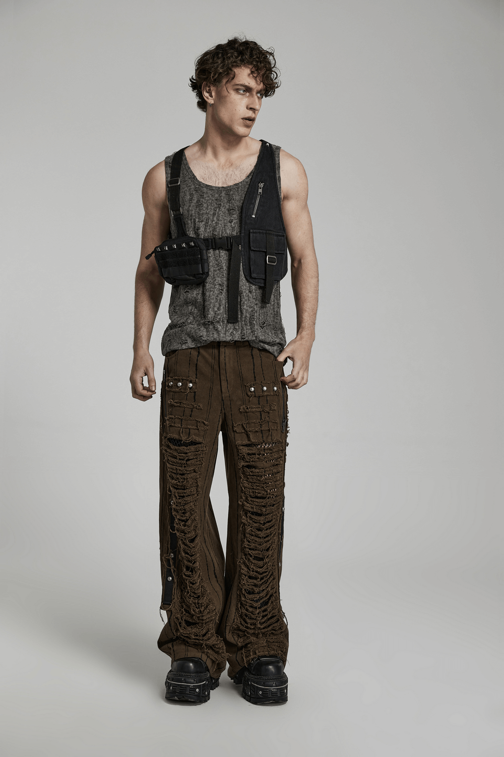 Model showcasing Tactical Punk Detachable Bag with Belt, combining fashion and functionality in an urban setting.