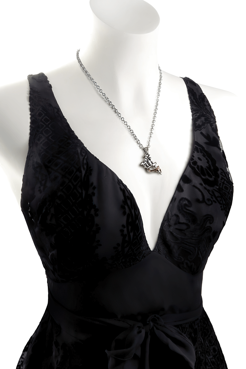 Stylish black dress featuring a Tattoo Gun pendant necklace on a mannequin, perfect for tattoo lovers and alt-style enthusiasts.