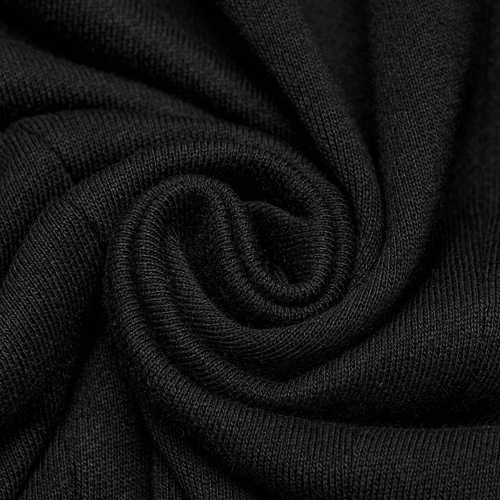 Close-up of soft black fabric showcasing its texture, ideal for streetwear styles like techwear hoodies.