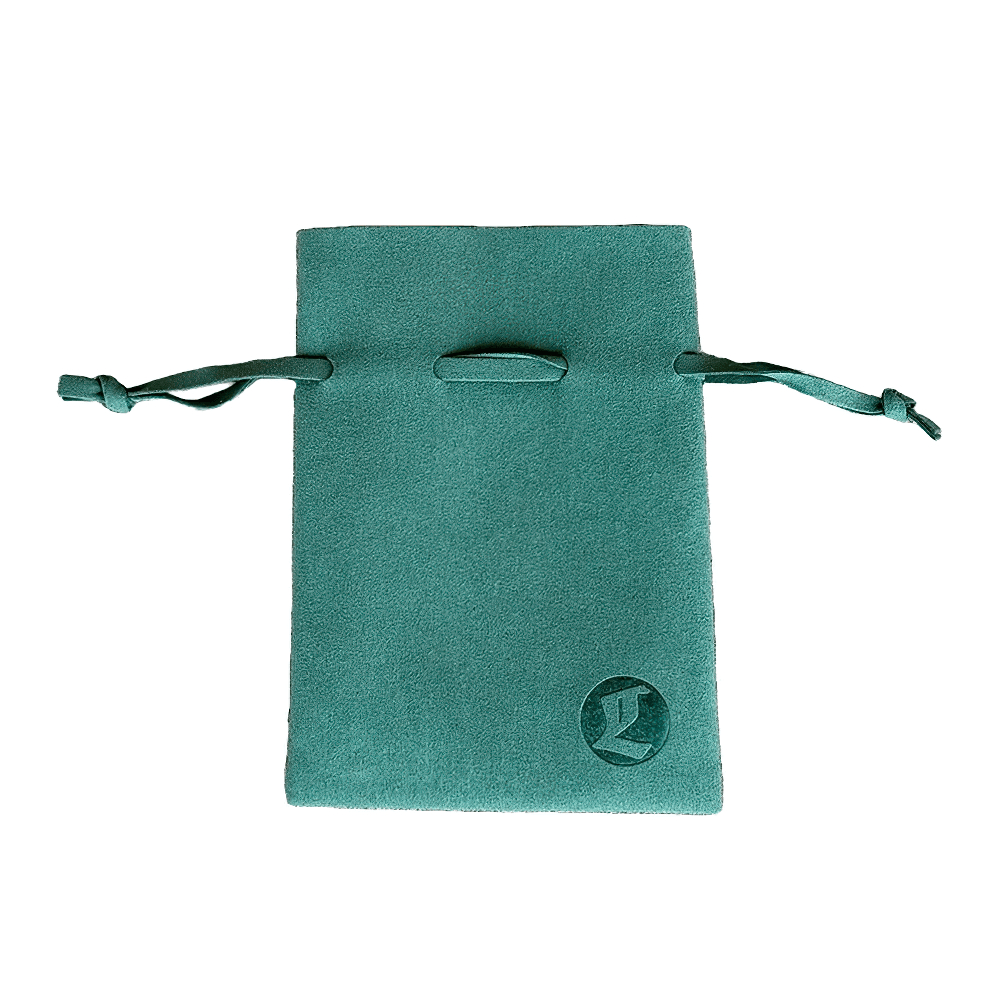 Templar Cross Pattée Pewter Pendant for Gothic Style in a teal pouch with drawstrings.