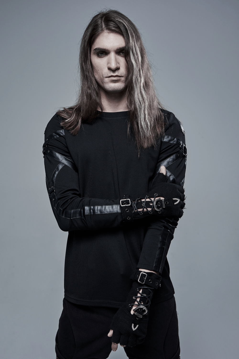 Model showcasing stylish textured punk gloves with side zippers and adjustable loops, exuding edgy fashion.