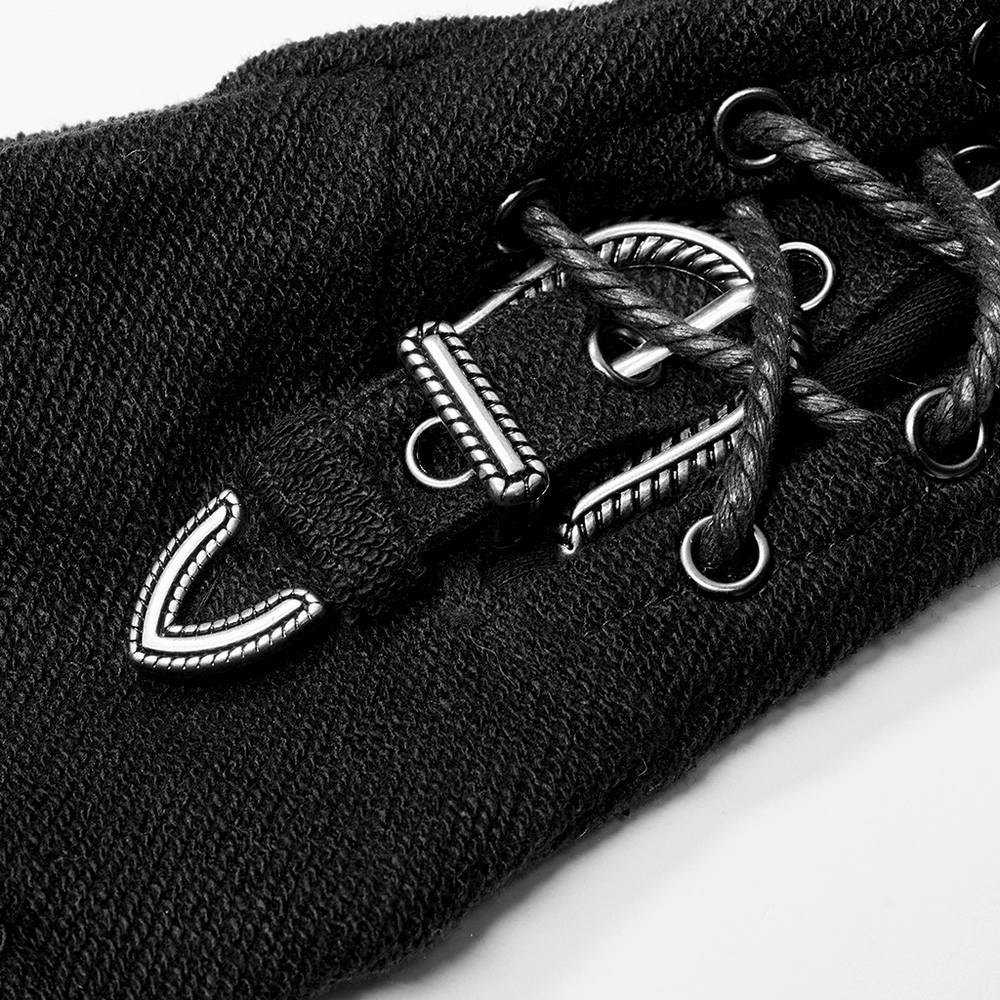 Close-up of a textured punk glove showcasing stylish side zipper and adjustable loop detail.