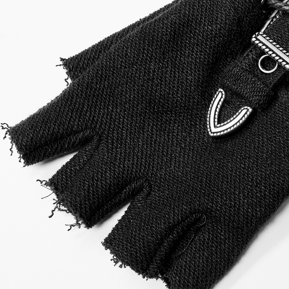 Textured black punk gloves with side zippers and adjustable loop for a stylish fit.
