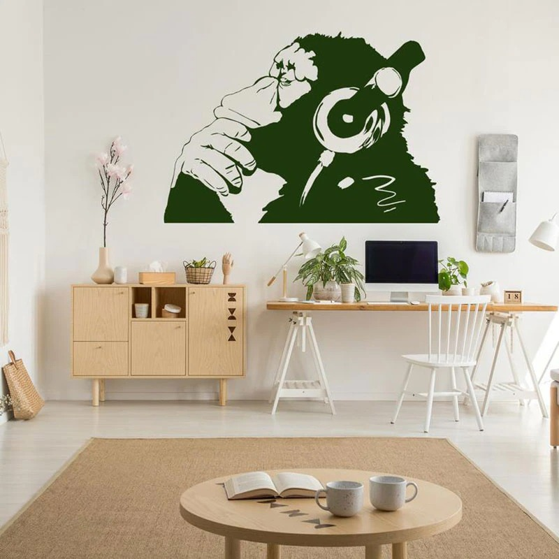 Thinking monkey Banksy wall sticker vinyl decal decor for home office with headphones and modern design.
