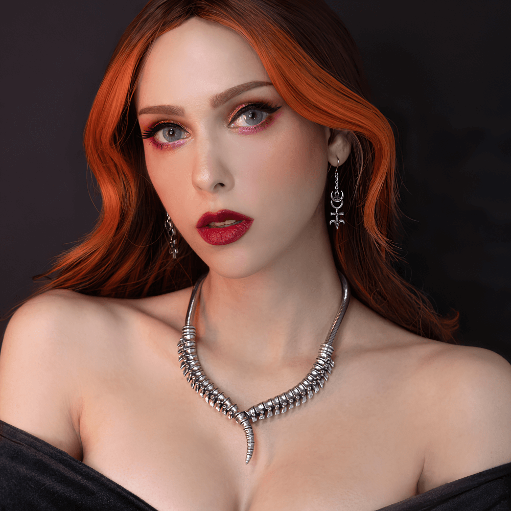 Model wearing the Thoracic Vertebrae-Inspired Spine Collar Necklace, showcasing its bold anatomical design and gothic elegance.
