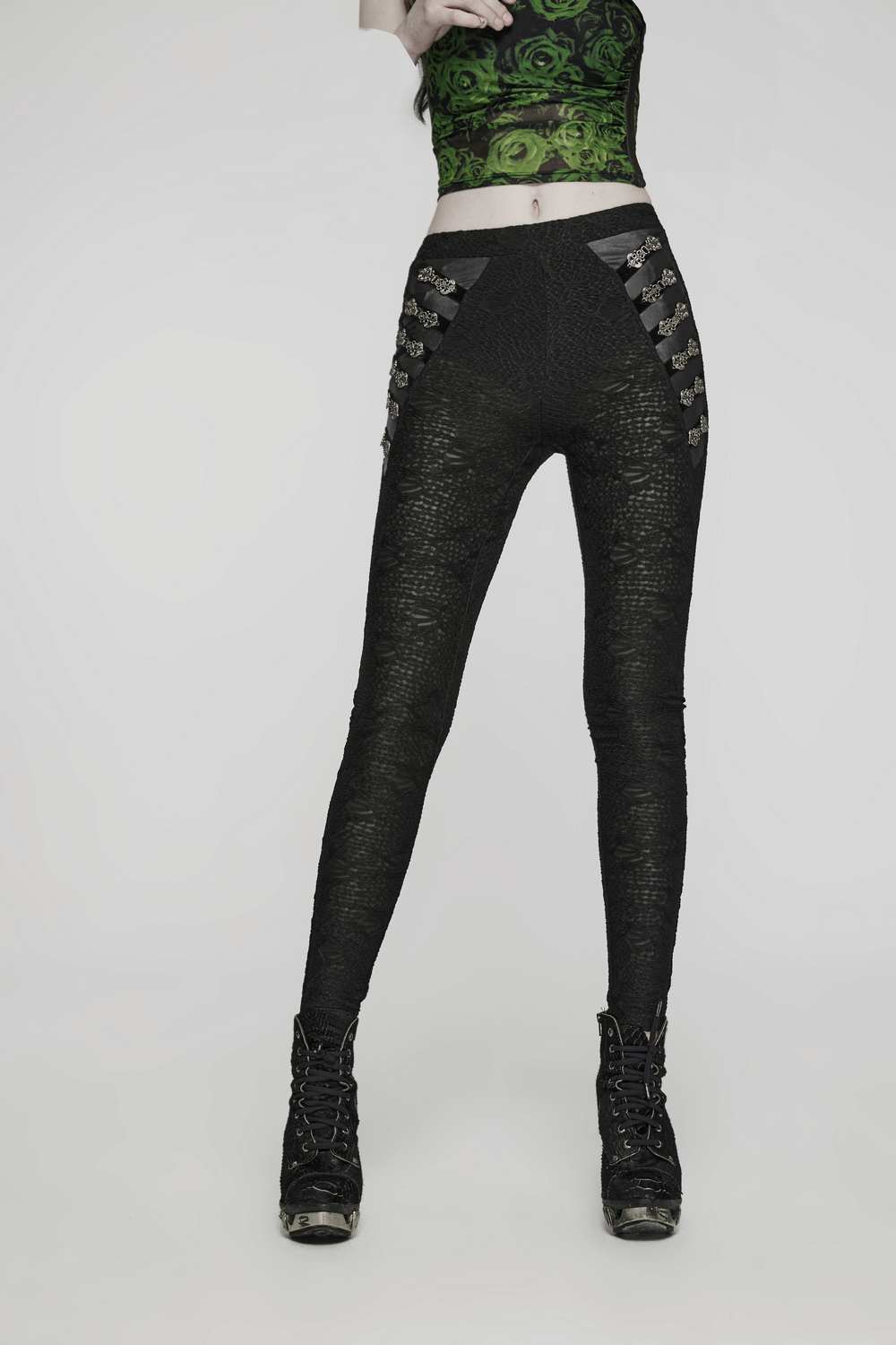 Gothic black lace skull leggings with engraved buckles, perfect for edgy fashion enthusiasts.