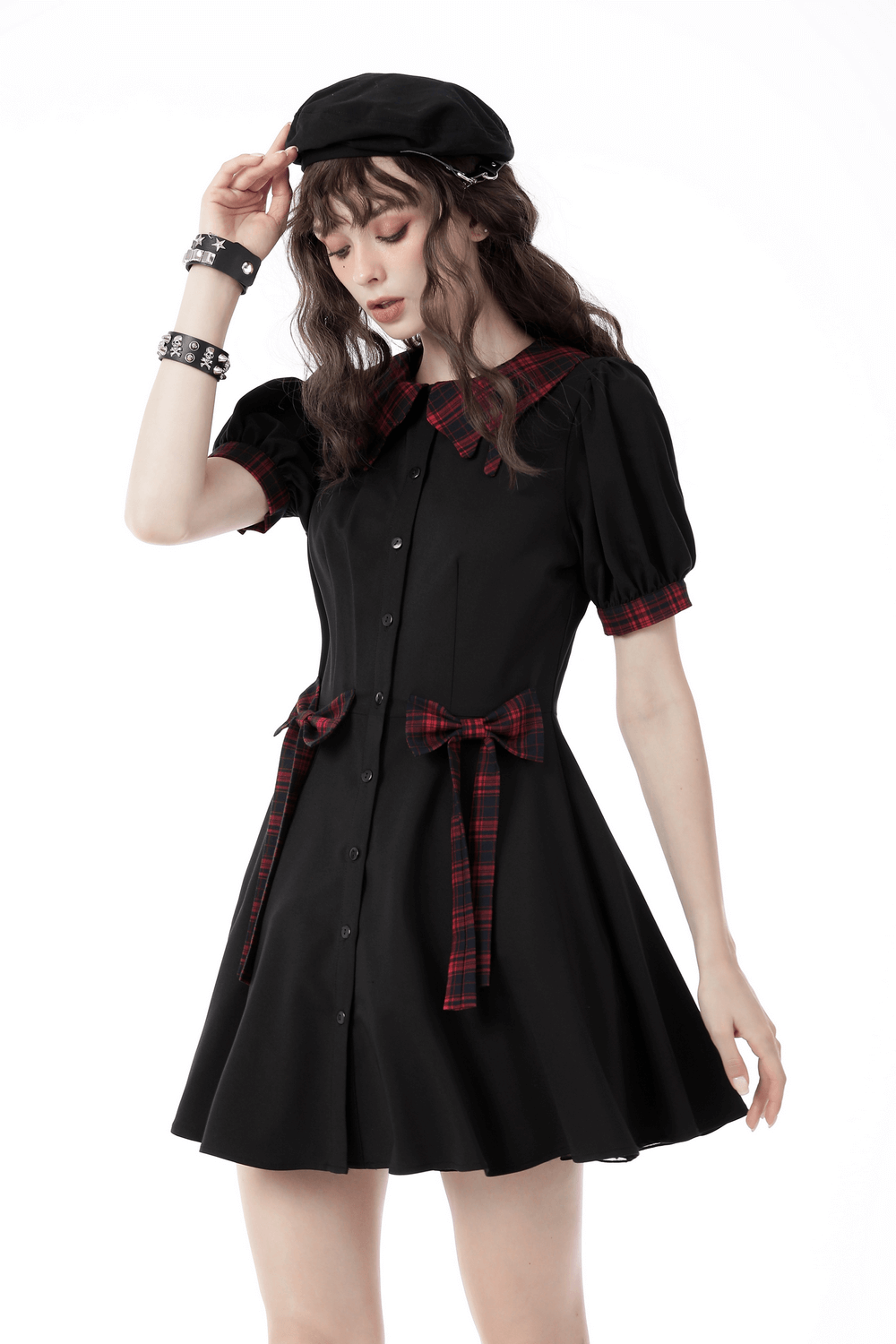 Trendy black A-line dress with plaid accents and bow details, perfect for casual outings in spring and summer.