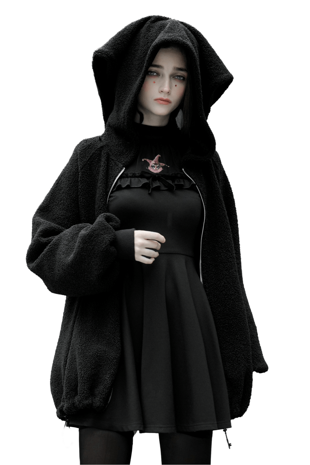 Trendy black hooded jacket with doll backpack, featuring clown hat design and cozy teddy fleece material.