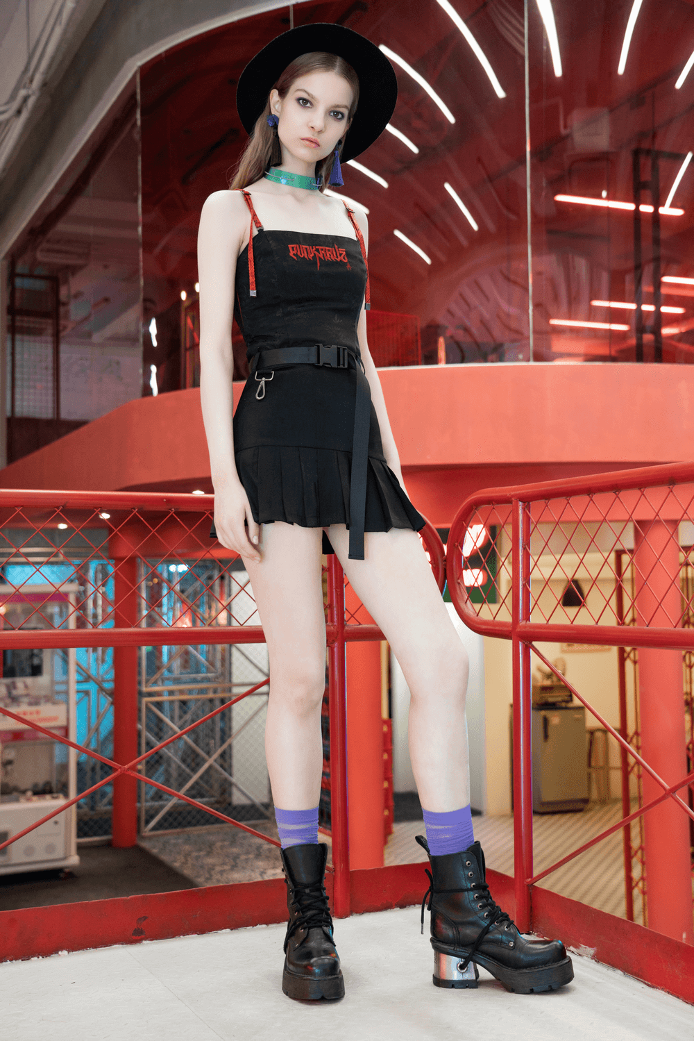 Trendy Gothic Buckle Mini Skirt with D-Ring detail, styled with edgy streetwear accessories and pleated design.